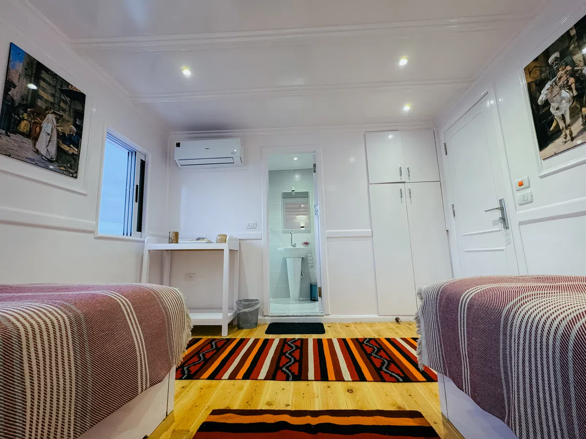 Dahabiya cabin interior aboard Soul of the Nile luxury Nile cruise — 2027 Solar Eclipse trip