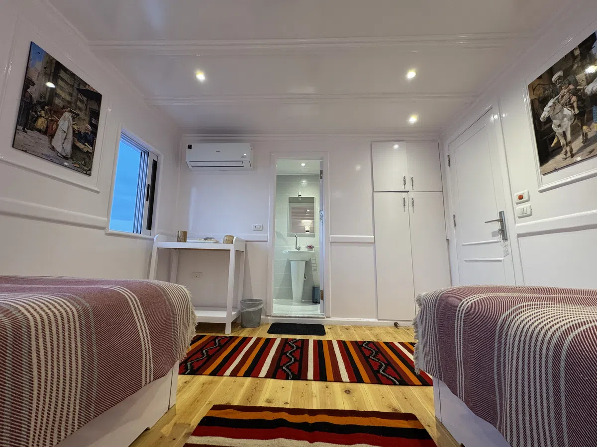 Dahabiya cabin interior aboard Soul of the Nile luxury Nile cruise — 2027 Solar Eclipse trip