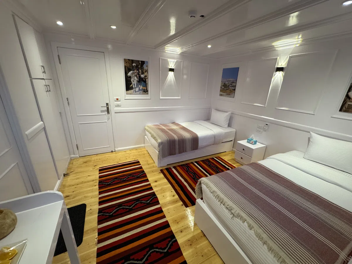 Dahabiya cabin interior aboard Soul of the Nile luxury Nile cruise — 2027 Solar Eclipse trip