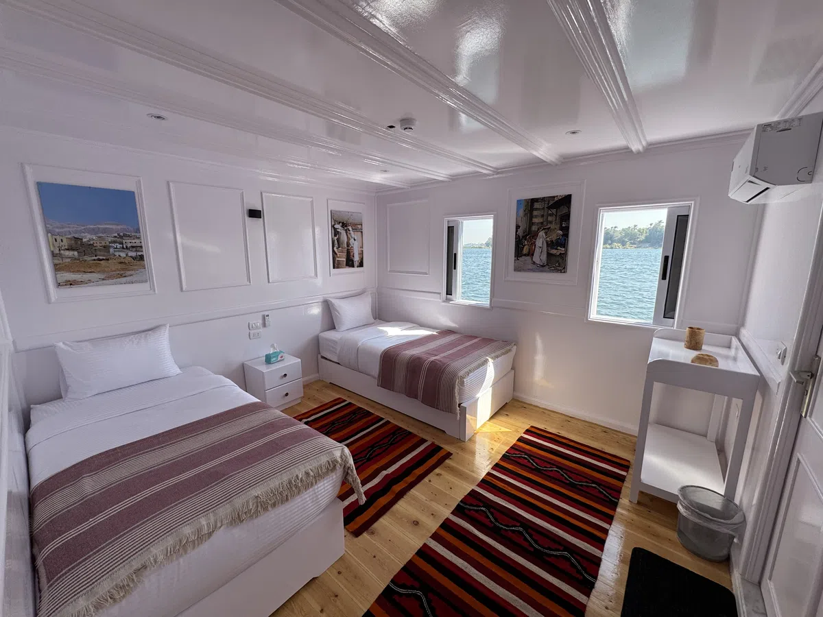 Dahabiya cabin interior aboard Soul of the Nile luxury Nile cruise — 2027 Solar Eclipse trip