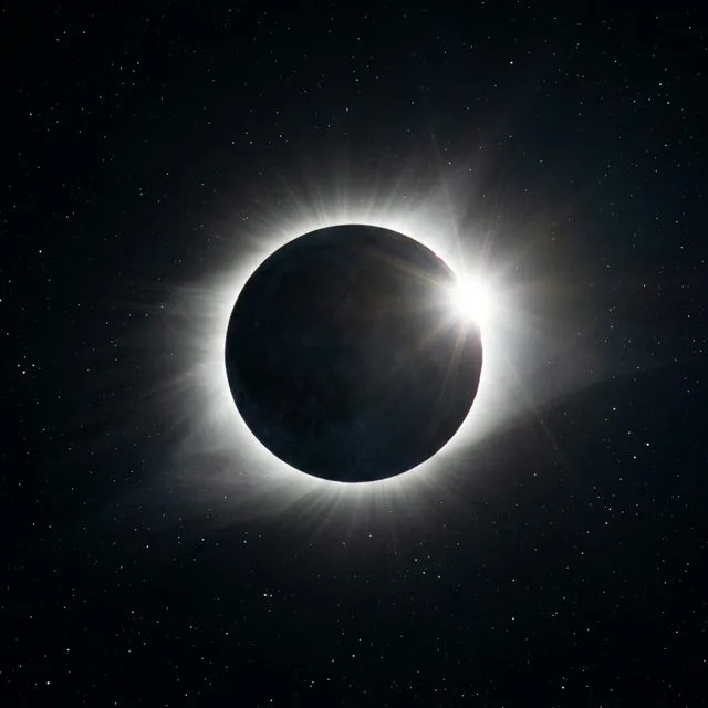 Diamond ring effect during a total solar eclipse showing brilliant point of sunlight and glowing corona ring