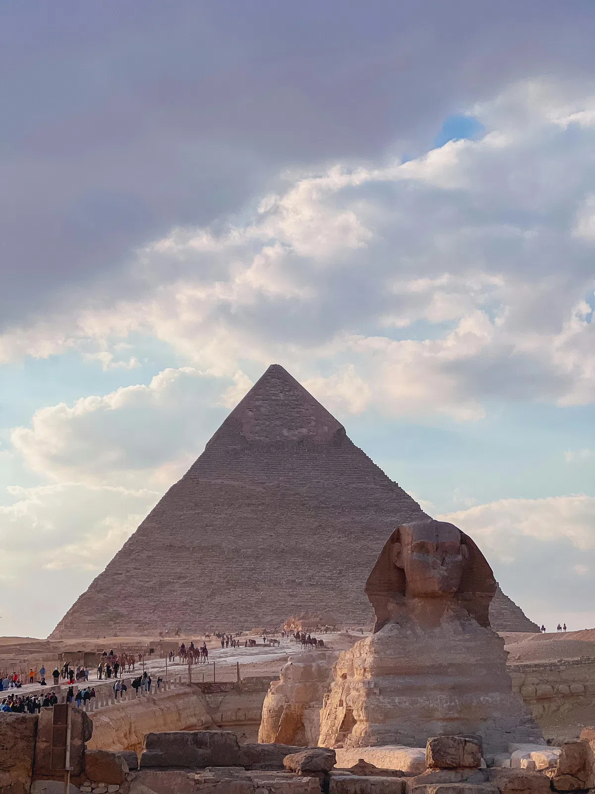 The Great Pyramids of Giza and the Sphinx at golden hour