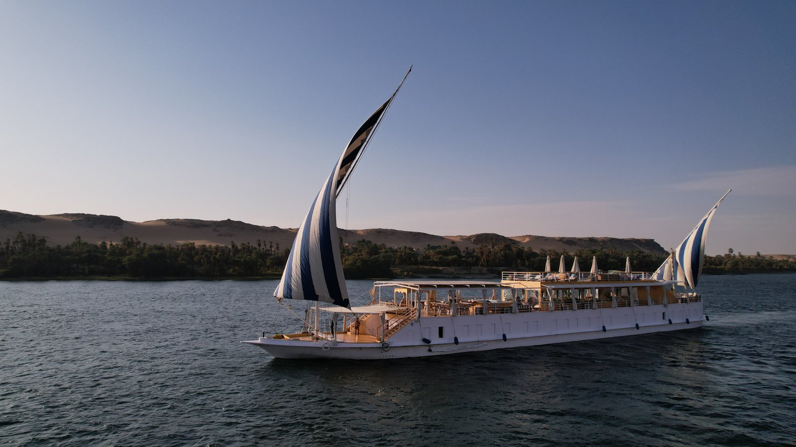 Luxury Soul of the Nile Dahabiya cruise sailing peacefully on the river