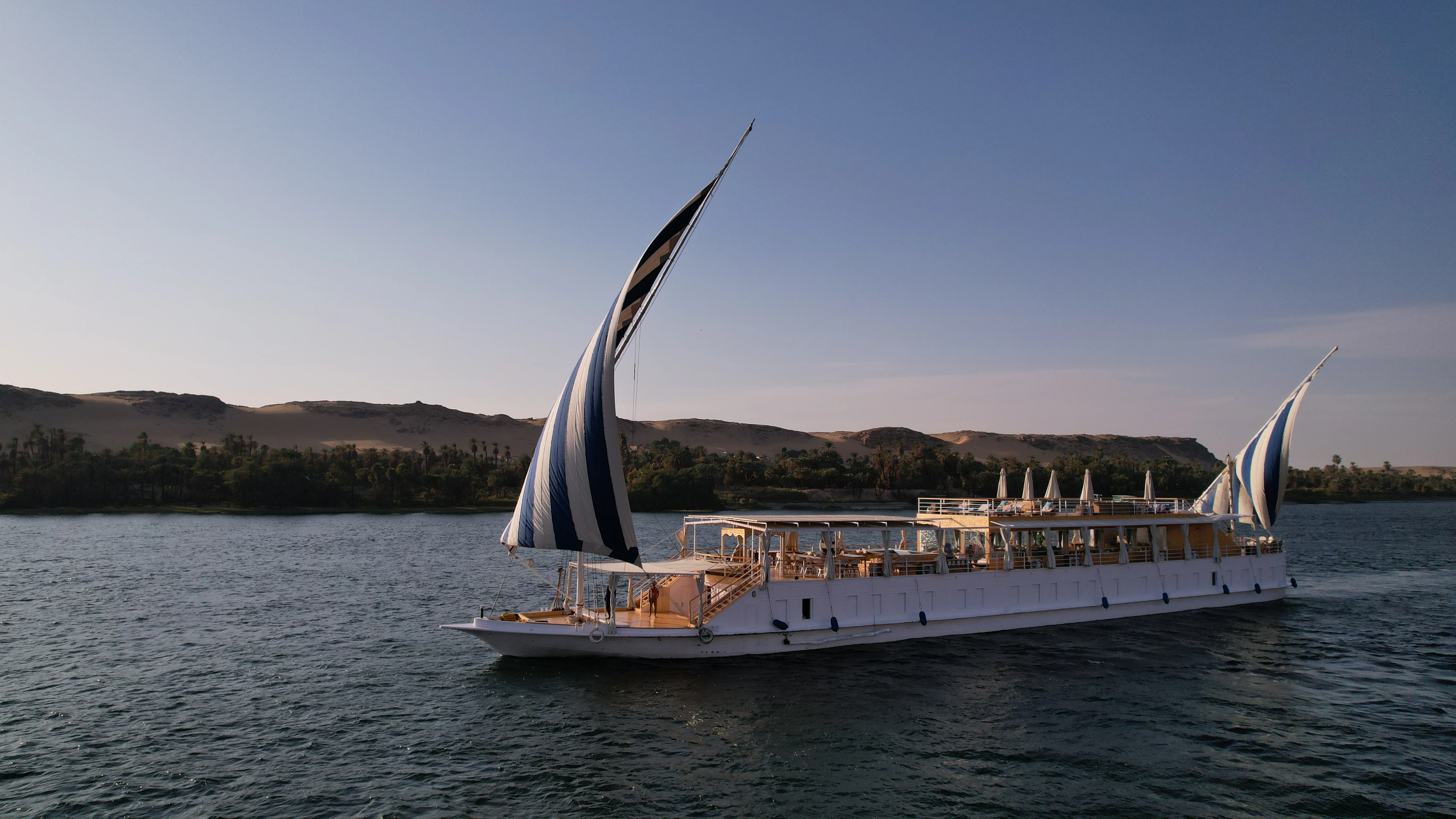 Luxury Soul of the Nile Dahabiya cruise sailing peacefully on the river